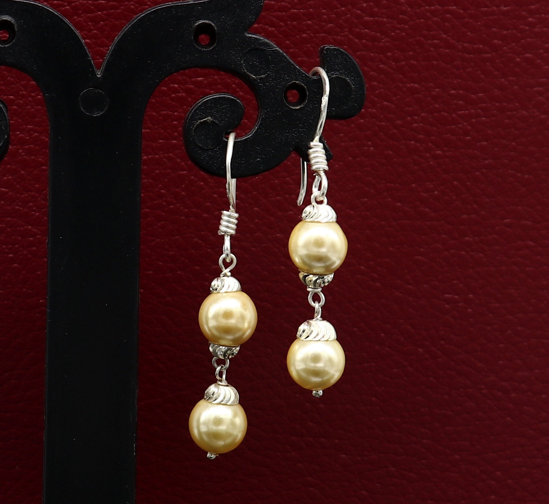 Sterling silver handmade hoop earrings with dangling pearls, perfect for bridesmaids and special occasions, by TRIBAL ORNAMENTS.