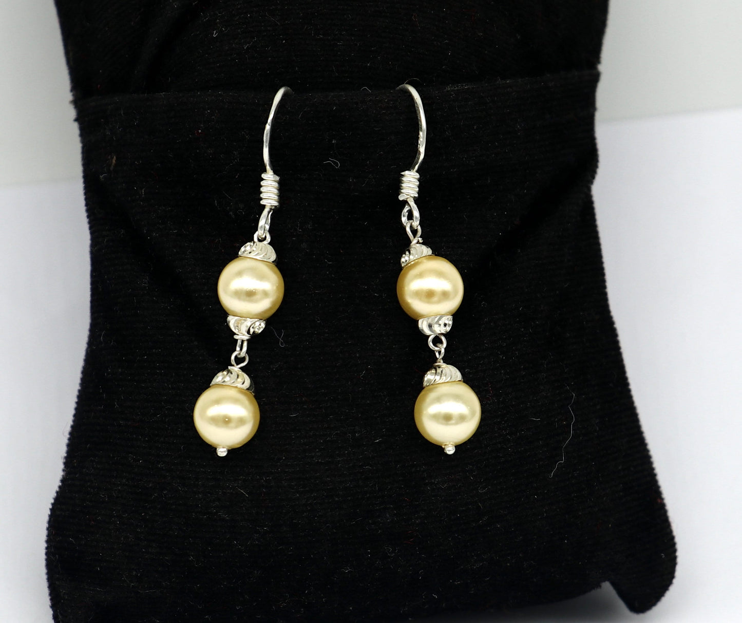 Sterling silver handmade hoop earrings with dangling pearls, perfect for bridesmaids and special occasions, by TRIBAL ORNAMENTS.
