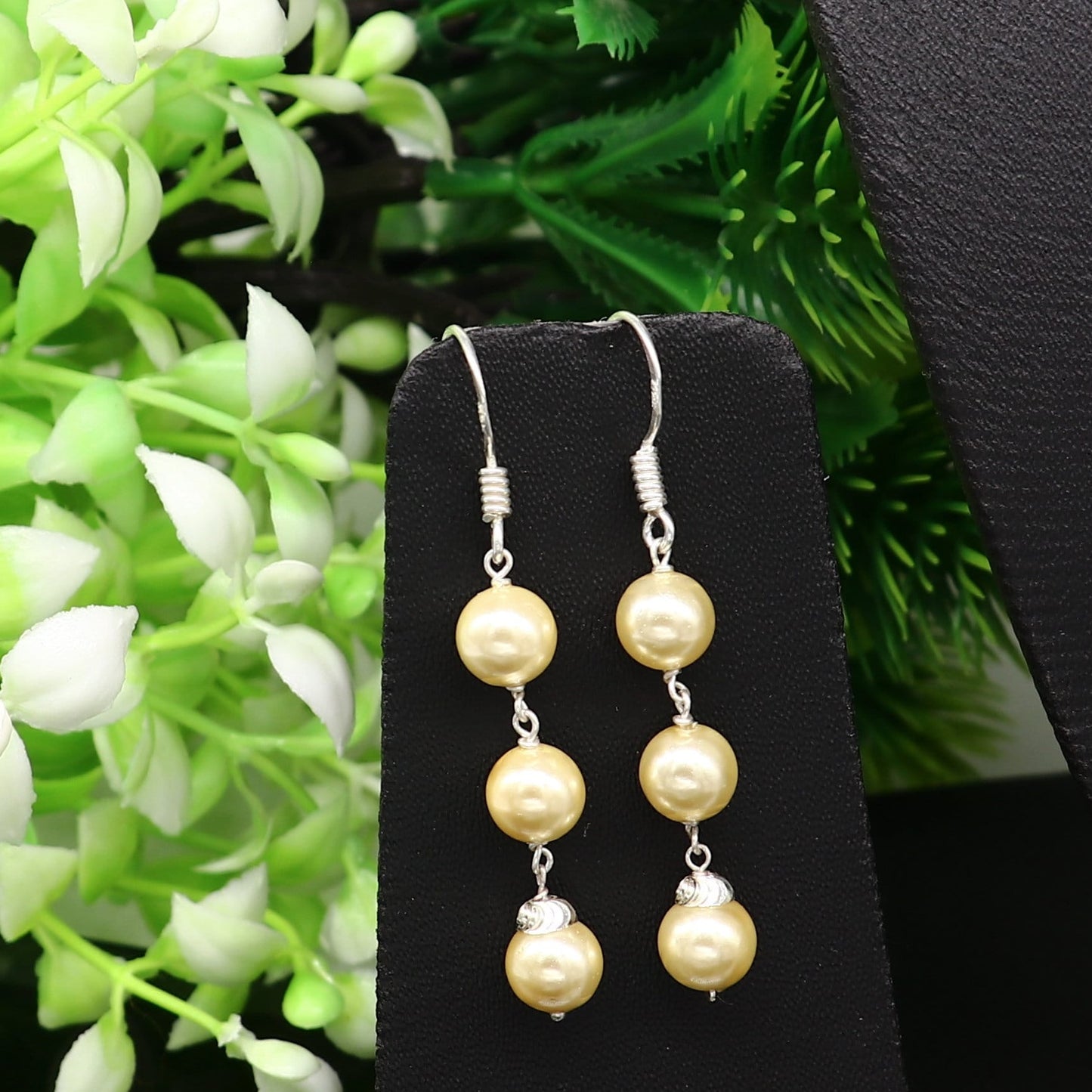 Sterling silver handmade hoop earrings with dangling pearls, designed for bridesmaids, featuring a custom hook and elegant drop style.