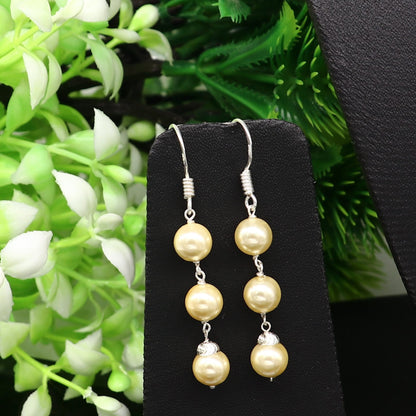 Sterling silver handmade hoop earrings with dangling pearls, designed for bridesmaids, featuring a custom hook and elegant drop style.
