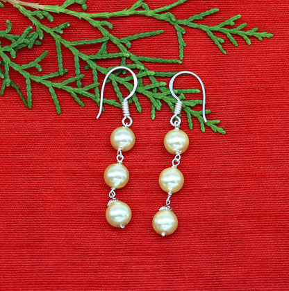 Sterling silver handmade hoops with dangling pearls, drop earrings for bridesmaids, custom hook design by Tribal Ornaments.