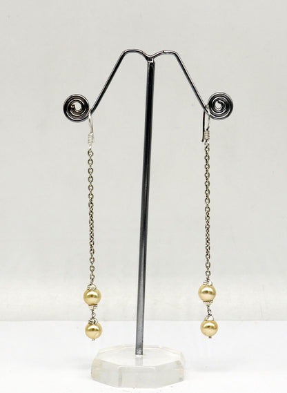 Sterling silver handmade hoop earrings with dangling pearls, stylish drop design, perfect for bridesmaids from TRIBAL ORNAMENTS.