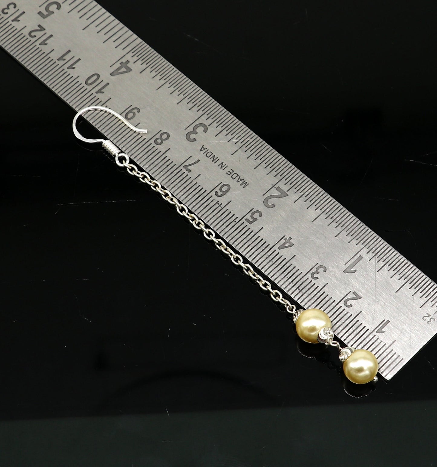 Sterling silver handmade hoop earrings with dangling pearls, perfect for bridesmaids and special occasions, by TRIBAL ORNAMENTS.