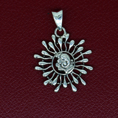 925 sterling silver Ganesha floral pendant by TRIBAL ORNAMENTS, handmade unisex jewelry with intricate design and personalized style.