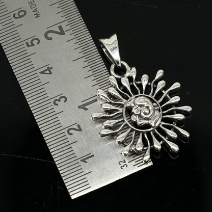 Sterling silver Ganesha floral pendant by TRIBAL ORNAMENTS, handcrafted unisex jewelry with intricate design and personalized style.