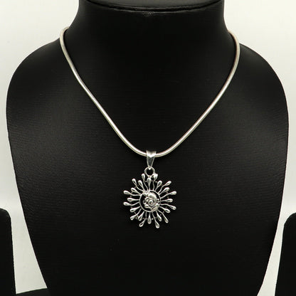 925 sterling silver Ganesha floral pendant, handmade tribal jewelry, stylish unisex idol necklace with personalized design.