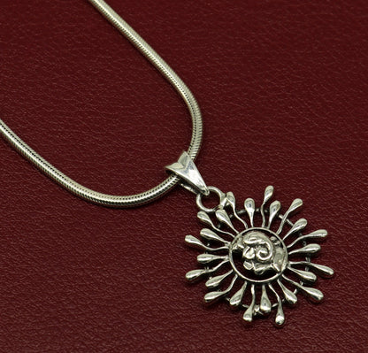 Sterling silver Ganesha floral pendant by TRIBAL ORNAMENTS, handmade unisex jewelry featuring intricate Ganesha idol design.