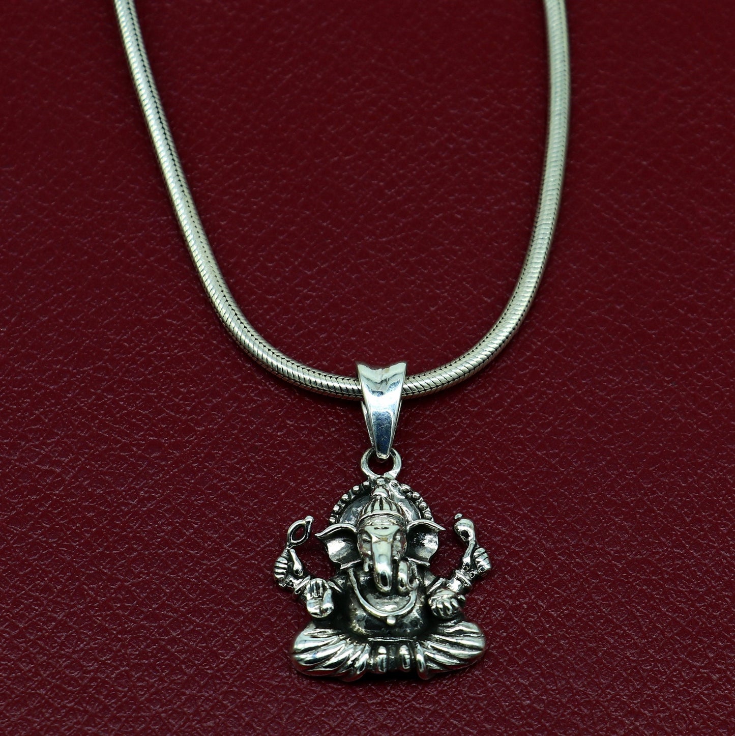 Unisex 925 sterling silver Ganesha pendant featuring intricate tribal design, handmade jewelry by TRIBAL ORNAMENTS.