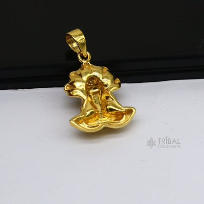 Sterling silver Mahakal pendant by TRIBAL ORNAMENTS featuring gold polish, unisex Shiva idol jewelry, handmade designer gift piece.