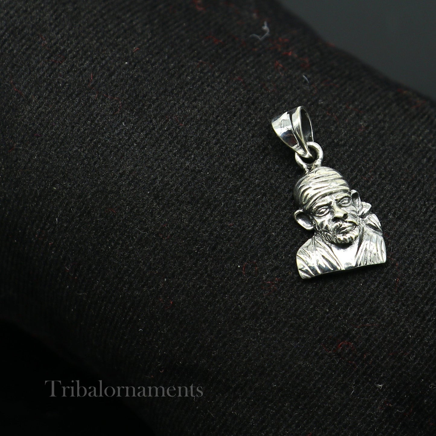 925 sterling silver Sai Baba pendant, handcrafted unisex jewelry, featuring detailed Indian deity design, personalized tribal jewelry.