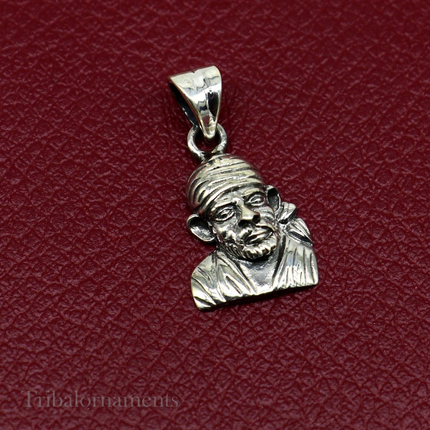 Unisex 925 sterling silver Sai Baba pendant featuring intricate handmade tribal design, personalized jewelry by TRIBAL ORNAMENTS.