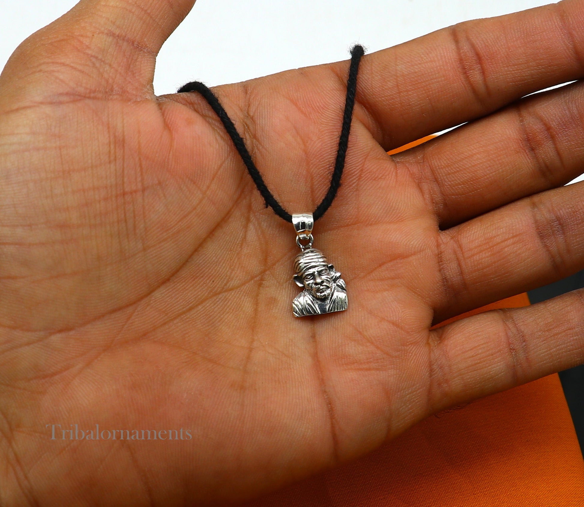 Unisex 925 sterling silver Sai Baba pendant with intricate tribal design, handmade Indian deity jewelry by TRIBAL ORNAMENTS