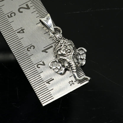 Handmade 925 sterling silver Ganesha pendant, featuring tribal design, unisex style, personalized jewelry, and intricate Indian idol craftsmanship.