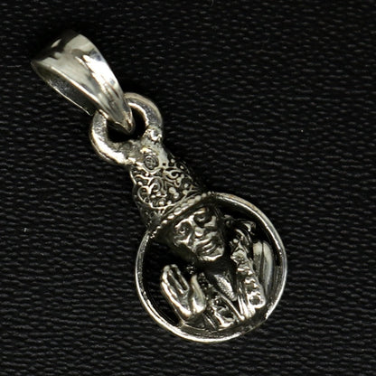 Sterling silver Sai Baba pendant by Tribal Ornaments, handmade unisex jewelry featuring detailed idol image and personalized design.