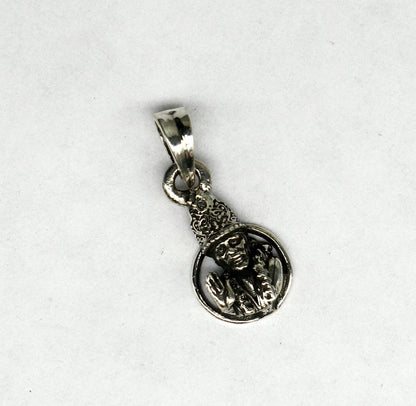 Sterling silver Sai Baba pendant by TRIBAL ORNAMENTS, unisex handmade jewelry featuring an Indian idol design and personalized style.
