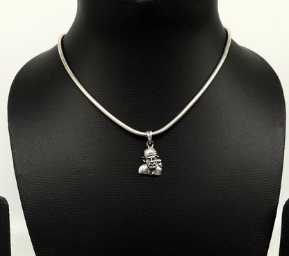Sterling silver Sai Baba pendant by Tribal Ornaments, unisex handmade jewelry featuring detailed idol design and personalized style.