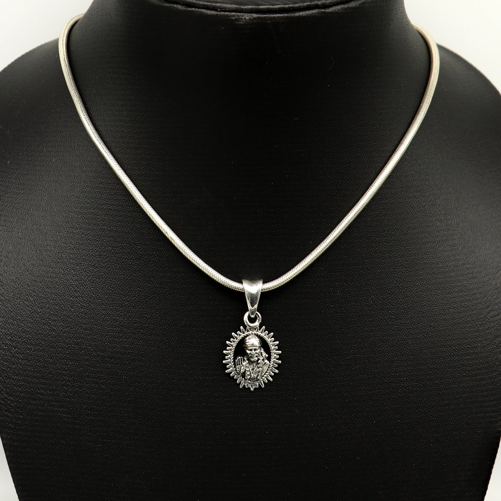 925 sterling silver Sai Baba pendant by TRIBAL ORNAMENTS, handmade Indian idol jewelry, stylish unisex personalized pendant.