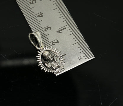 925 sterling silver Sai Baba pendant featuring intricate handmade Indian design, stylish unisex jewelry from Tribal Ornaments.