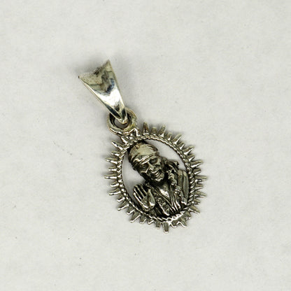 Sterling silver Sai Baba pendant by Tribal Ornaments, featuring intricate handmade Indian design, unisex personalized jewelry.