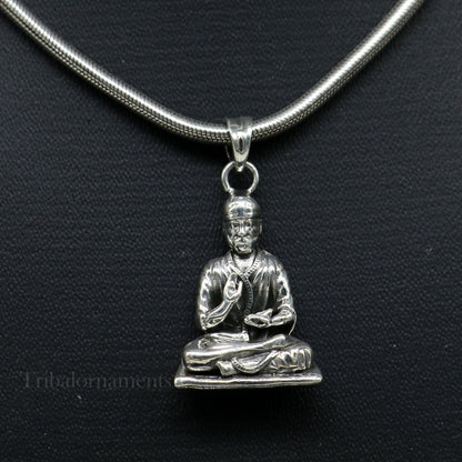 Sterling silver Sai Baba pendant by Tribal Ornaments, unisex Indian idol jewelry, handmade and personalized silver jewelry.