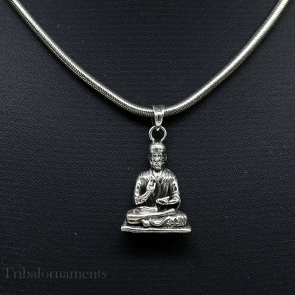 Sterling silver Sai Baba pendant by TRIBAL ORNAMENTS, handmade unisex jewelry featuring an intricate Indian idol design.