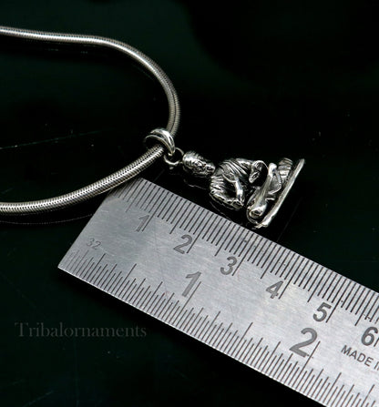 Sterling silver Sai Baba pendant by TRIBAL ORNAMENTS, handmade unisex jewelry with detailed idol design and personalized style.