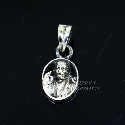 Sterling silver Sai Baba pendant, handmade unisex jewelry, detailed religious idol design, tribal-inspired Indian pendant.