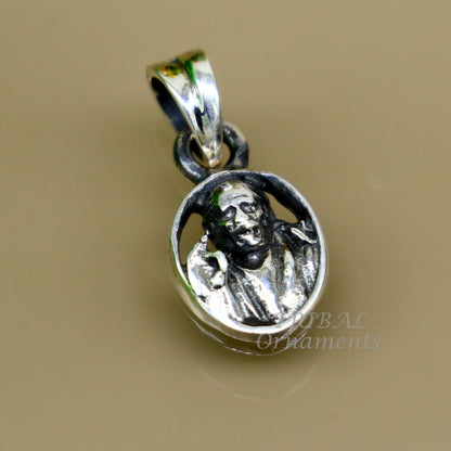Sterling silver Sai Baba pendant, unisex handmade tribal jewelry, detailed Indian idol design, stylish and personalized accessory.