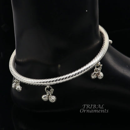 Handmade Indian sterling silver ankle bracelet with jingling bells and tribal design, traditional foot kada jewelry for women.