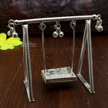 Sterling silver handmade Laddu Gopala Child Krishna swing, intricately crafted silver jhula with detailed religious motifs.