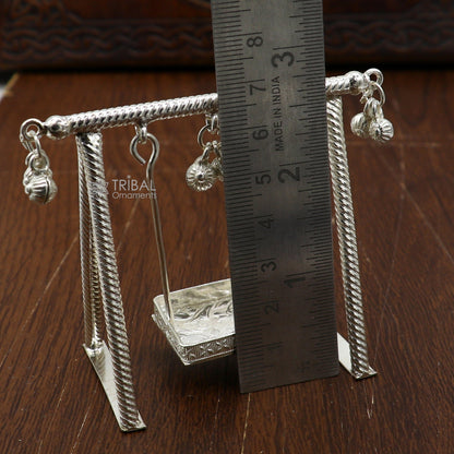 Handmade 925 sterling silver Laddu Gopala child Krishna swing, detailed silver jhula with intricate craftsmanship.