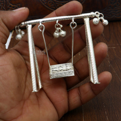 Handmade 925 Sterling silver Laddu Gopala child Krishna swing with intricate silver jhula, crafted by TRIBAL ORNAMENTS.