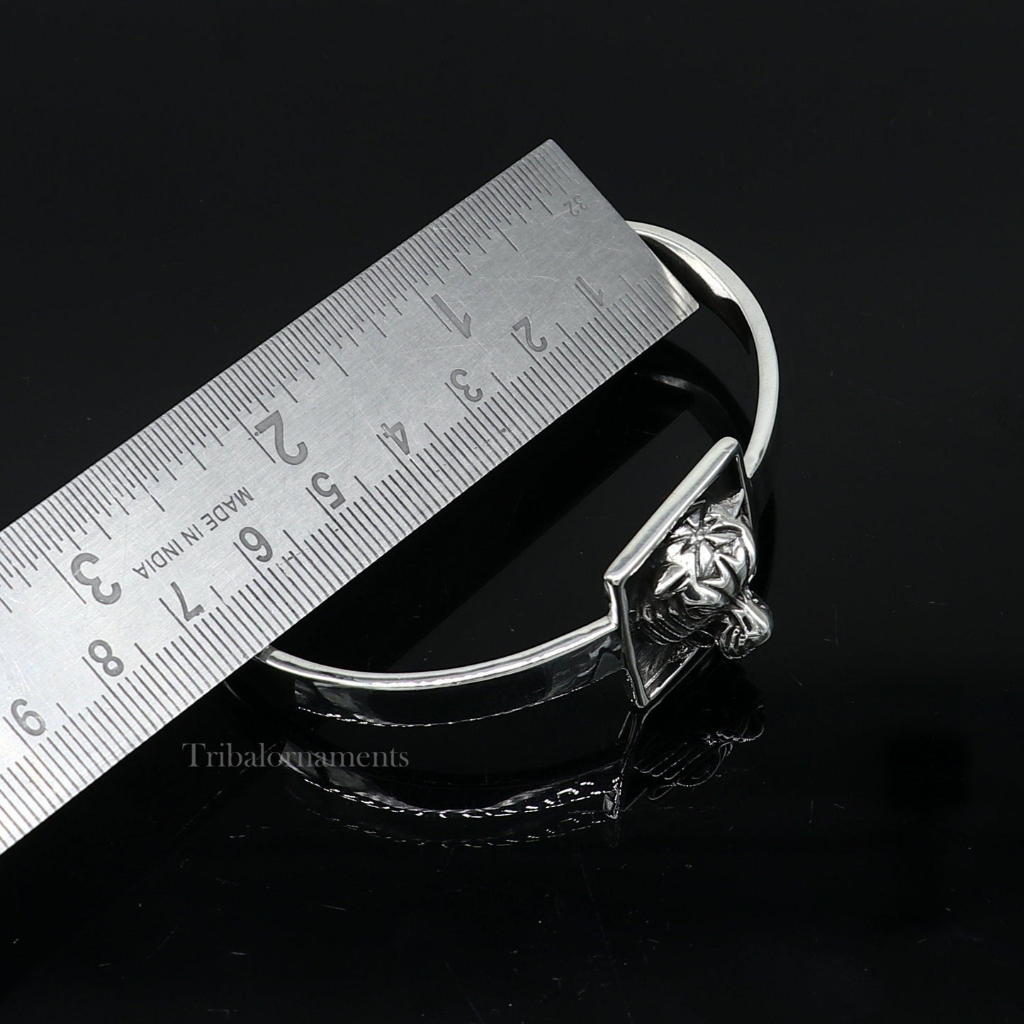 925 sterling silver lion face design adjustable bangle cuff bracelet by TRIBAL ORNAMENTS, unisex ethnic jewelry for gifting.