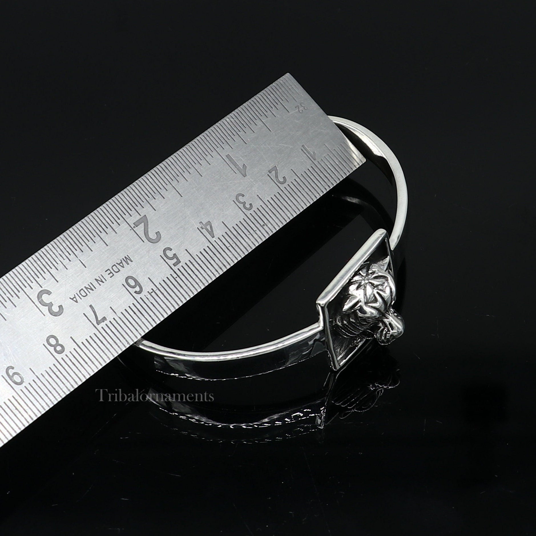 925 sterling silver lion face design adjustable bangle cuff bracelet by TRIBAL ORNAMENTS, unisex ethnic jewelry for gifting.
