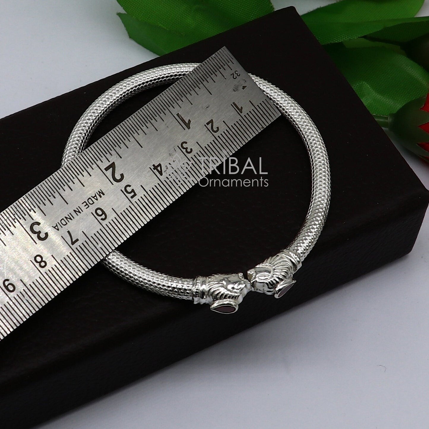 Sterling silver handmade lion face design kada bracelet by TRIBAL ORNAMENTS, lightweight cultural jewelry for men and women.