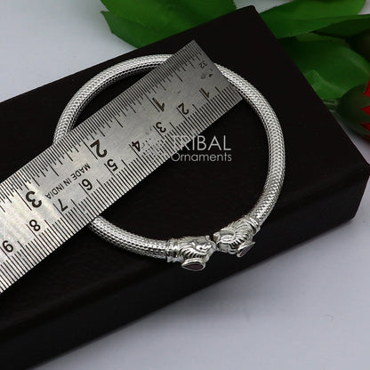 Sterling silver handmade lion face design kada bracelet by TRIBAL ORNAMENTS, lightweight cultural jewelry for men and women.