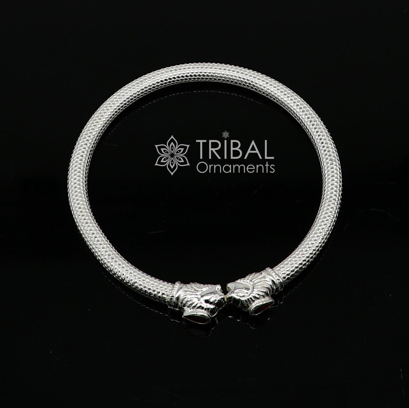 Sterling silver handmade lion face design kada bracelet by Tribal Ornaments, lightweight jewelry for men and girls.
