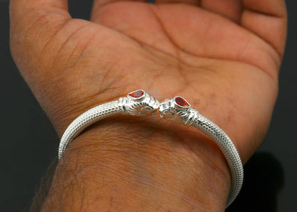 Sterling silver handmade lion face design kada bracelet by TRIBAL ORNAMENTS, lightweight jewelry for men and girls.