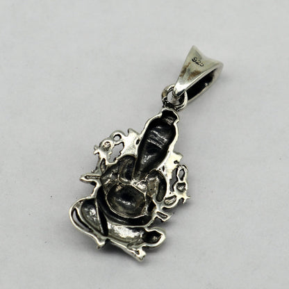 Sterling silver Lord Ganesha pendant by Tribal Ornaments, handmade unisex jewelry with intricate cross design, perfect for gifting.