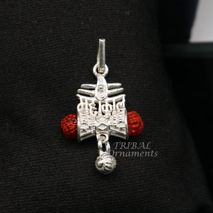 Sterling silver Lord Shiva Mahakal pendant with Damaru-style hanging drops, handcrafted tribal jewelry.