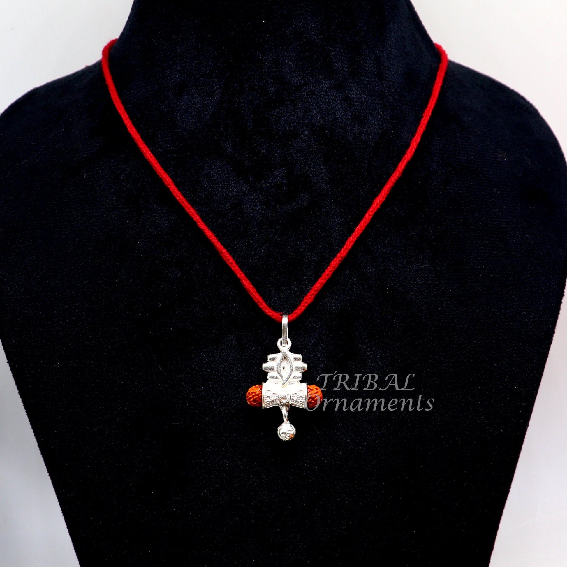 Sterling silver Lord Shiva damaru Rudraksha pendant for unisex jewelry, handmade and detailed tribal ornament design.