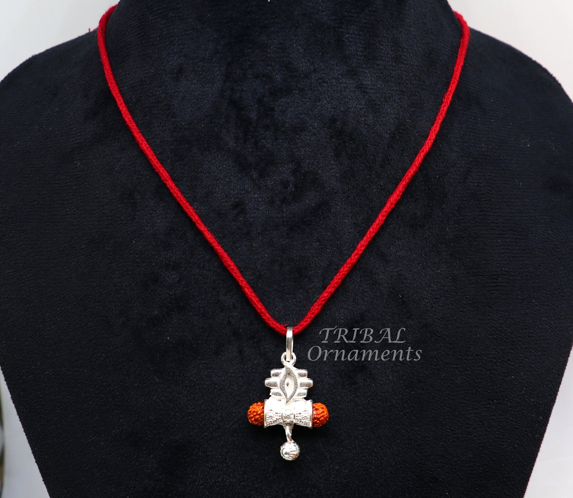 925 sterling silver Lord Shiva damaru style Rudraksha pendant for unisex jewelry, handmade with intricate design from Tribal Ornaments.