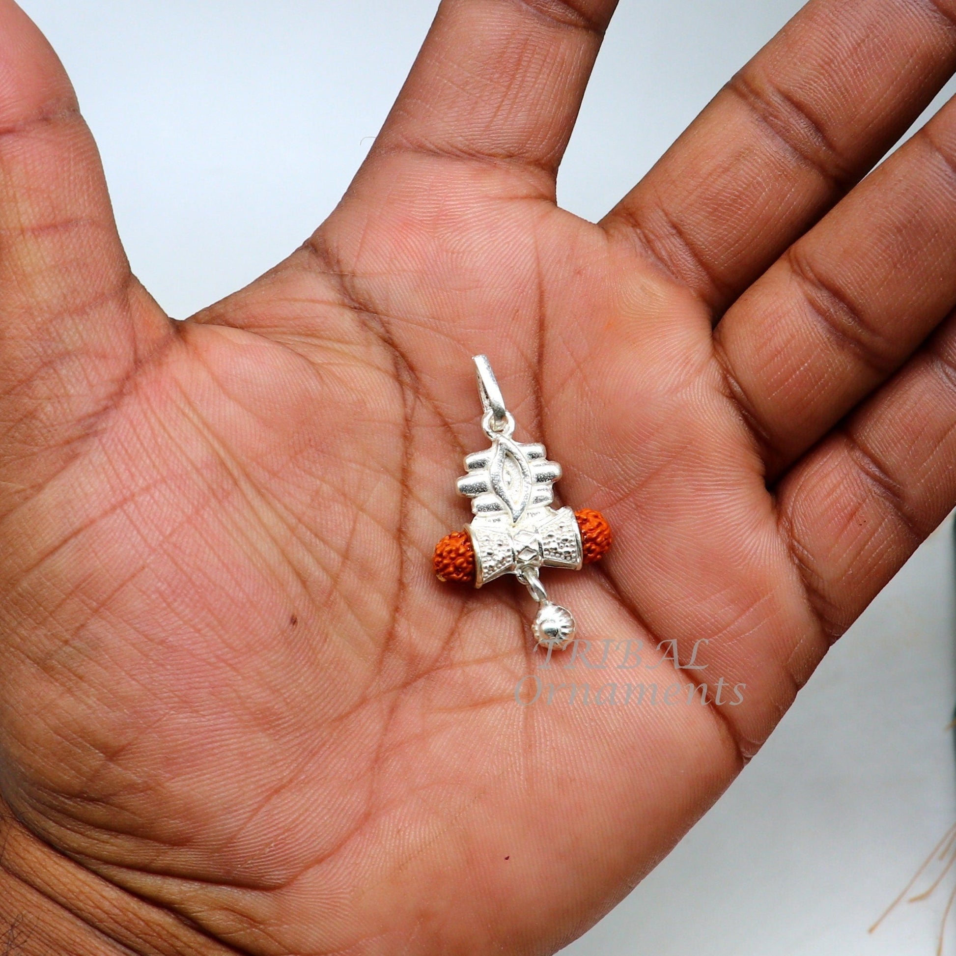 925 sterling silver Lord Shiva damaru Rudraksha pendant, handmade unisex jewelry with intricate design from Tribal Ornaments.