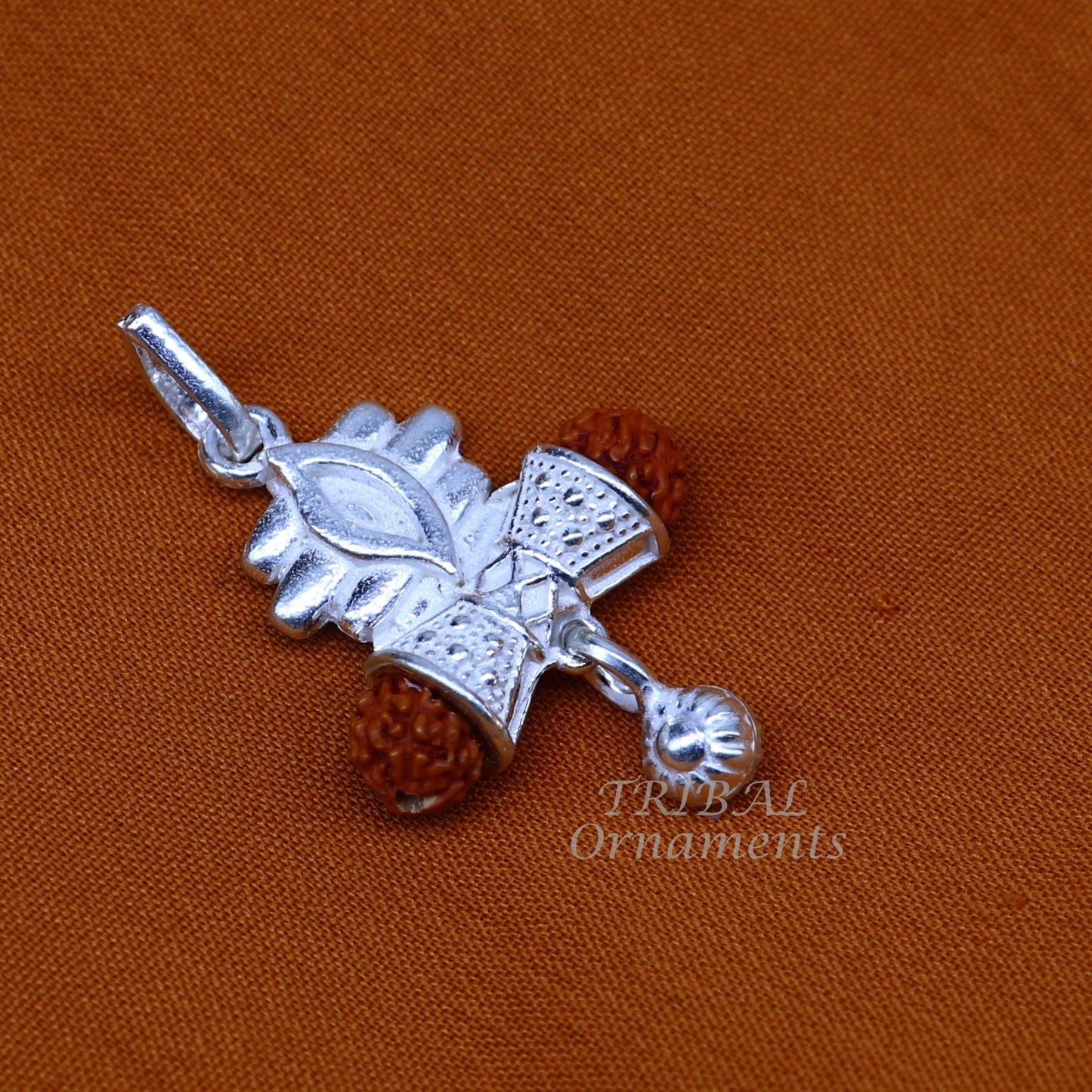 Sterling silver Lord Shiva damaru style Rudraksha pendant for unisex jewelry, handcrafted by Tribal Ornaments from India.