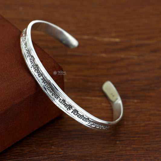 Sterling silver Gayatri Mantra cuff bracelet by Tribal Ornaments, unisex handmade Indian jewelry with engraved mantra design.