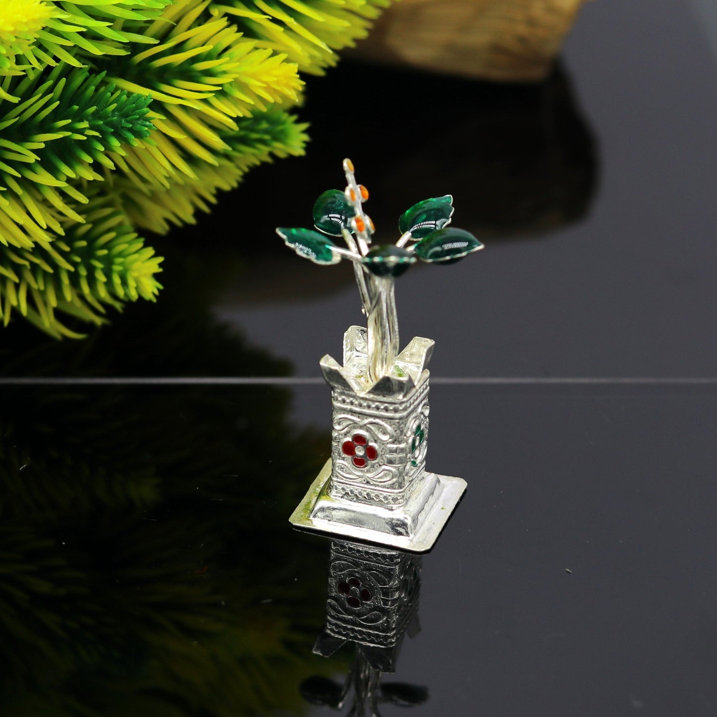 Handmade 925 sterling silver mini Tulsi basil plant for puja temple, crafted by Tribal Ornaments, with detailed silver utensils.