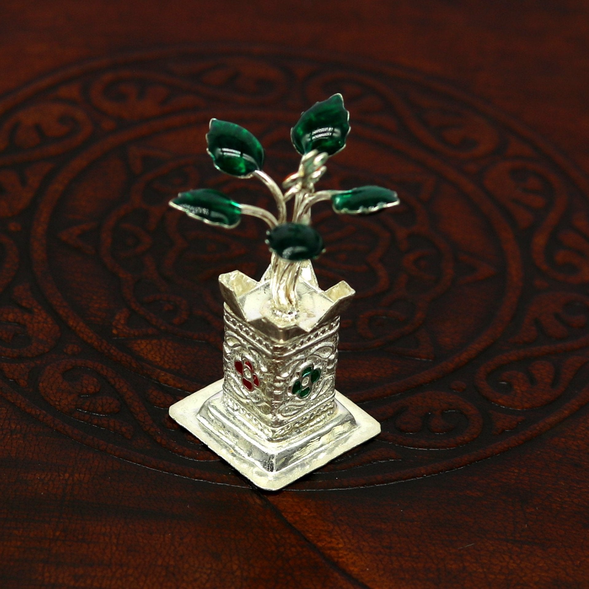 Handmade 925 sterling silver mini Tulsi plant for puja temple, featuring detailed basil rosary and customized silver utensils by Tribal Ornaments.