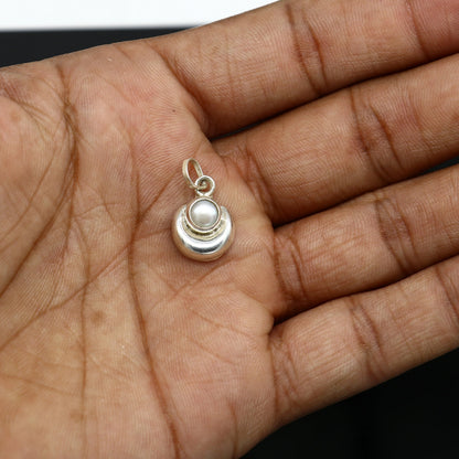 925 sterling silver moon pendant with natural pearl, unisex jewelry by TRIBAL ORNAMENTS, showcasing a handcrafted celestial design.