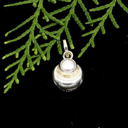 925 sterling silver moon pendant with natural pearl, handmade unisex jewelry by TRIBAL ORNAMENTS featuring a celestial design.