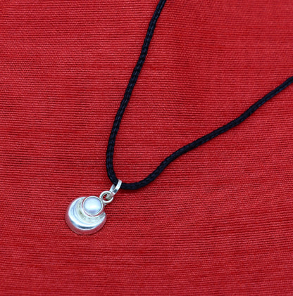 925 sterling silver moon pendant with natural pearl, unisex jewelry by TRIBAL ORNAMENTS, showcasing detailed craftsmanship and elegant design
